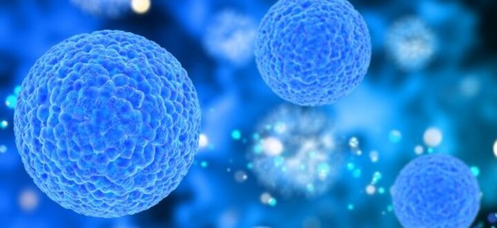 Blue cells floating against a glowing, blurred blue background.